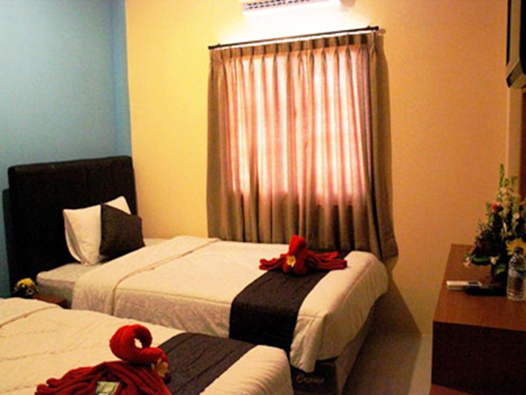 Asher Bali Transit Kuta Lombok Habitación foto